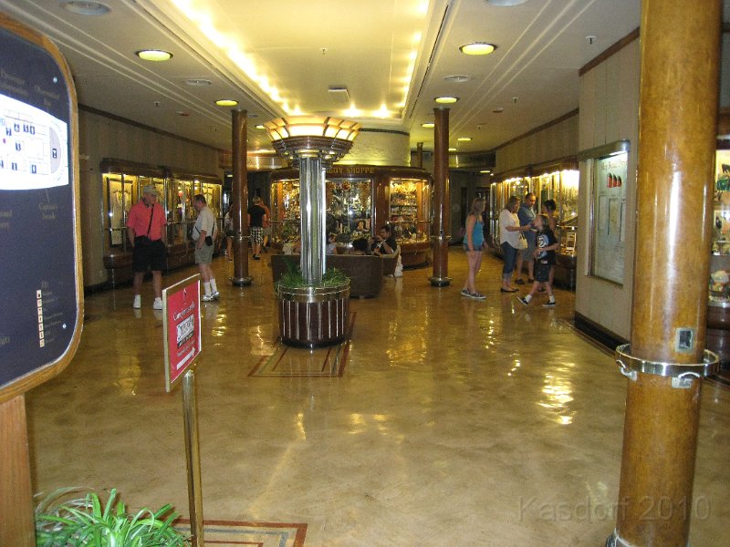 Queen Mary 2010 0760.JPG - The main lobby with stores down both sides.